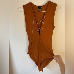 Orange /brown shirt . Never worn .